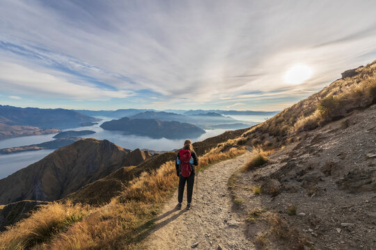 Woman hiking at Roys Peak, Lake Wanaka, New Zealand