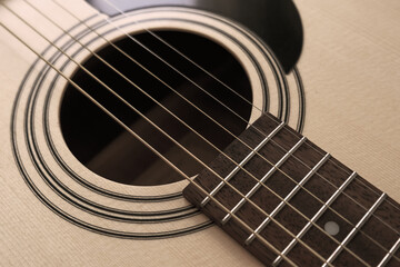 Obraz premium Details of classic acoustic guitar, strings and chords, guitar neck close up