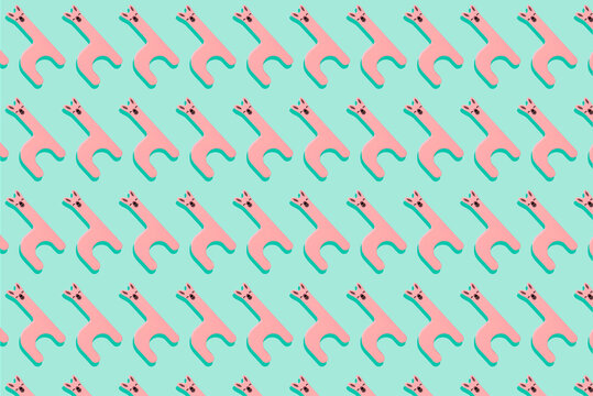 Cute pink llamas wooden toy in a row on green background