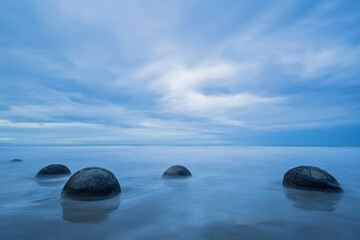 New Zealand, Oceania, South Island, Southland, Hampden, Otago, Moeraki, Koekohe Beach, Moeraki Boulders Beach, Moeraki Boulders, Round stones on beach
