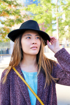 Portrait of woman wearing a hat, Barcelona, Spain