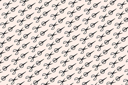 Black vintage scissors on pink background