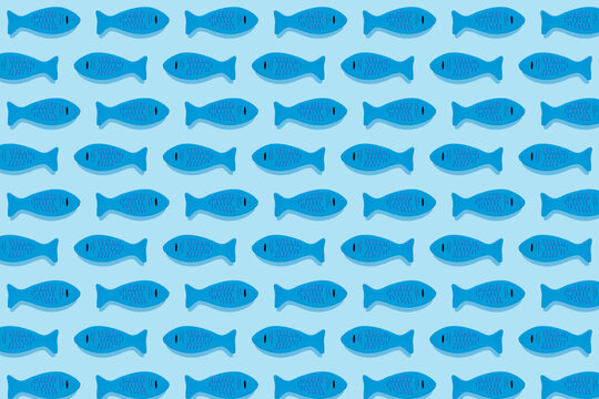 Studio shot of blue wooden toy fish