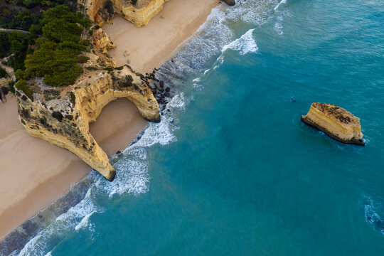 Portugal, Algarve, Lagoa, Drone view of cliffs and beach at Praia da Marinha