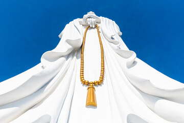 China, Hainan, Sanya, Giant statue of Guanyin of Nanshan holding prayer beads
