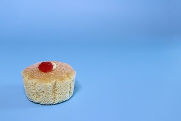 Cup cake delicious on blue background