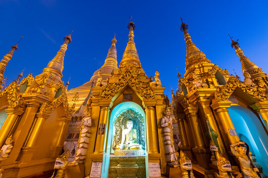 Myanmar, Yangon, Golden spires and Buddha statue at&Ocirc;&oslash;&Omega;Shwedagon pagoda