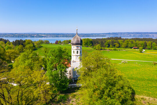 Germany, Bavaria, Munsing, Drone view of Church of Assumption of Virgin Mary in spring