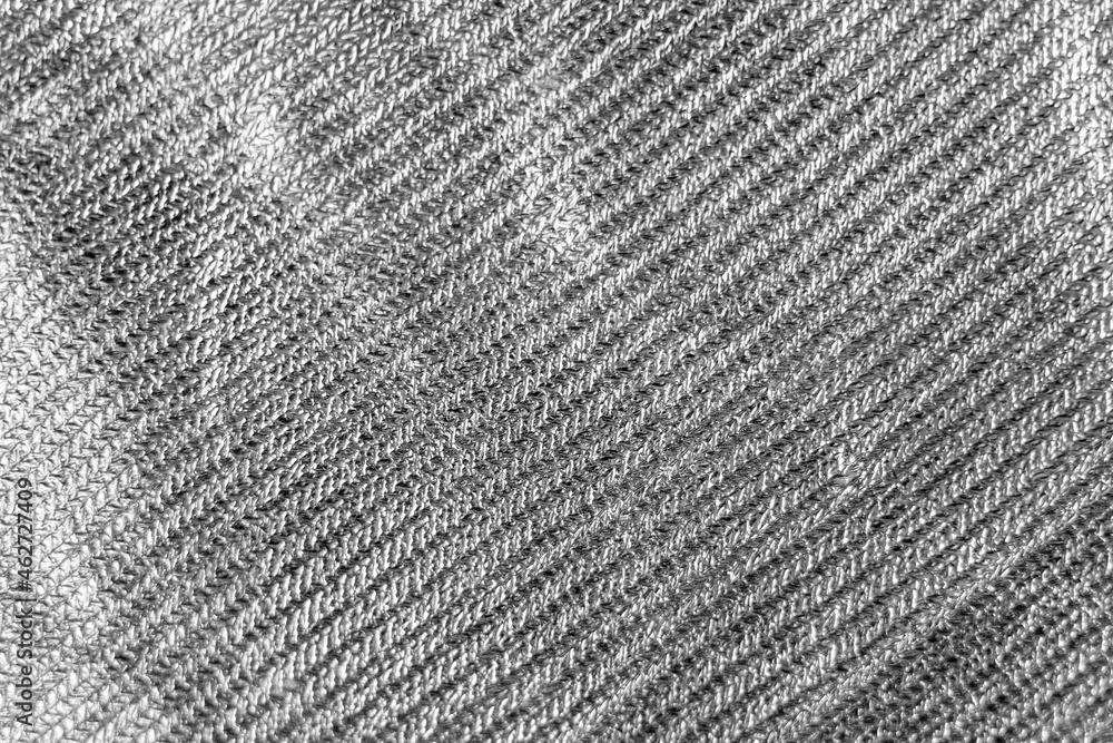 Poster the closeup look of fabric in grey. a fashion textile pattern for background texture or presentation