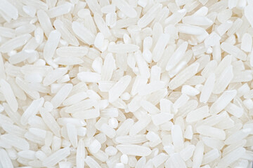 a closeup look of the pile of rice grain. a white rice texture for a nature background. a simple shoot of goods for elements.