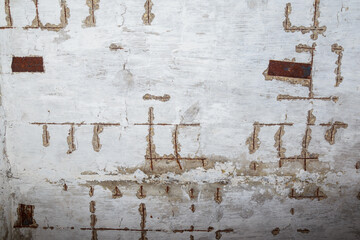 Rough surface of an old destroyed grunge wall. Textured background. Blank for design. Underlay or...