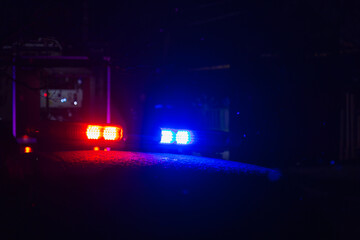 Abstract blurred background with flasher in the dark. Special signals of emergency services....