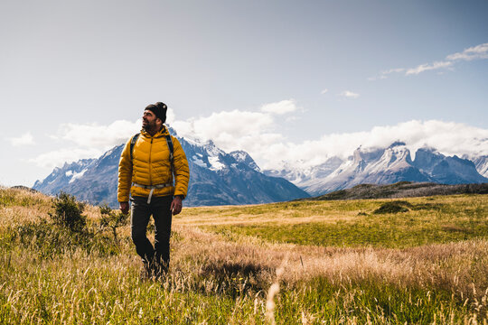 Hiker exploring Torres Del Paine National Park in Patagonia, South America