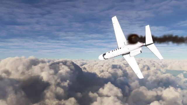 Engine of a private airplane explodes mid-flight and it falls down with a trail of smoke.Plane crash due to engine failure when flying above clouds.The turbine engine burning with dark smoke and fire