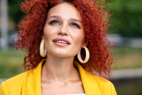 Beatiful woman with red curly hair, portrait