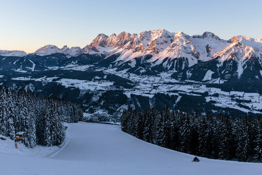 Austria, Styria, Schladming, Planai ski slope at dusk with&Ocirc;&oslash;&Omega;Dachsteinmassiv in background