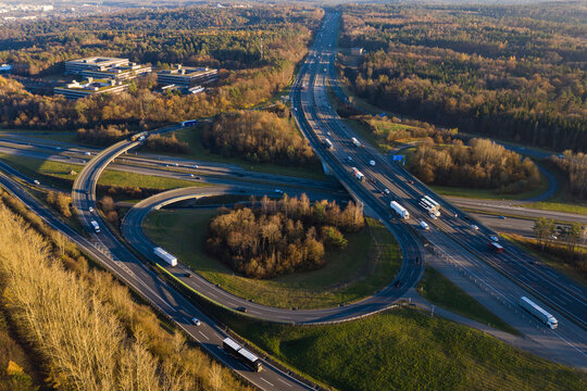 Germany, Baden-Wurttemberg, Stuttgart, Aerial view of traffic on Bundesautobahn 8 at dusk