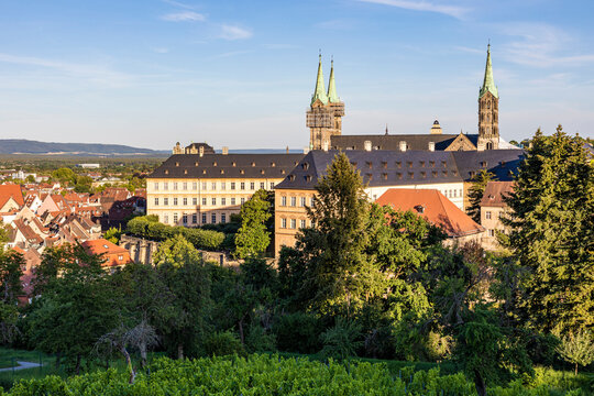 Germany, Bavaria, Bamberg, Bamberg Cathedral and surrounding old town buildings at dusk