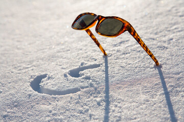 Sunglasses left in snow