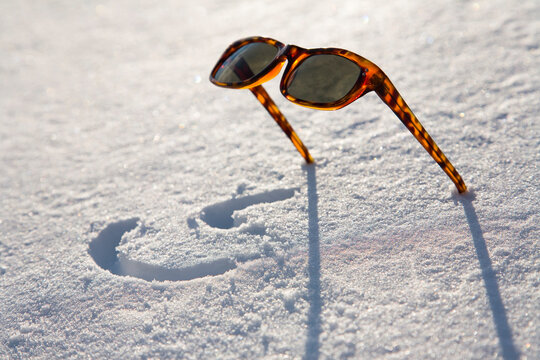 Sunglasses left in snow