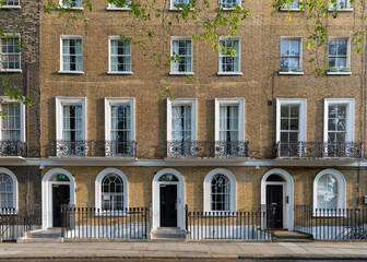 UK, England, London, Empty street and facade of residential building during COVID-19 pandemic