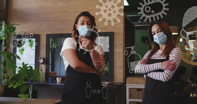 Animation of coronavirus icons over two caucasian female hairdressers wearing face masks