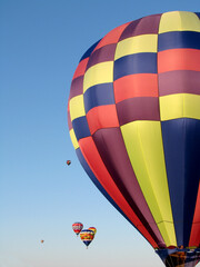 colorful hot air balloons and blue sky as a background 