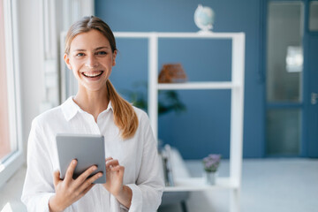 Young woman using digital tablet