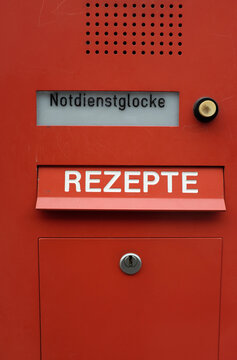 Red mailbox of a pharmacy, Hamburg, Germany