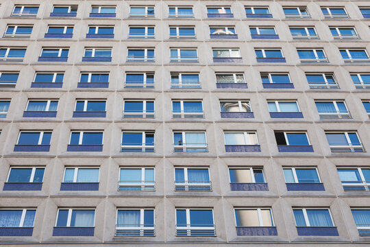 Germany, Berlin-Mitte, part of facade of concrete tower block with reflection of television tower