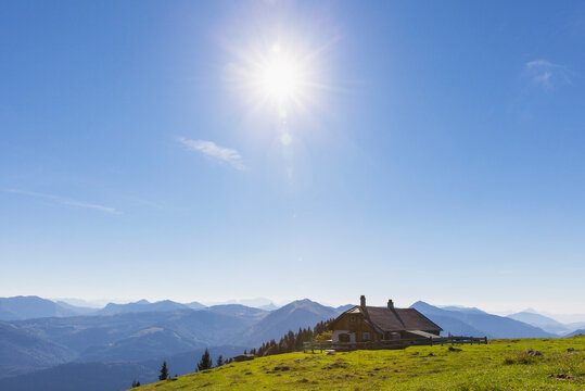 Cottage on Schafberg peak against blue sky