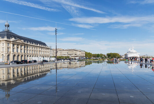 France, Gironde, Bordeaux, Blue sky reflecting in Miroir dEau pool