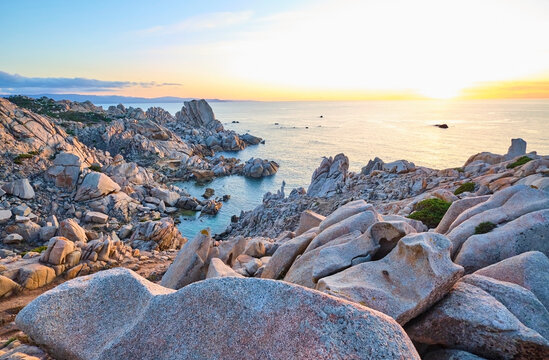 Italy, Province of Sassari, Santa Teresa Gallura, Rocky shore of Cape Testa at sunset