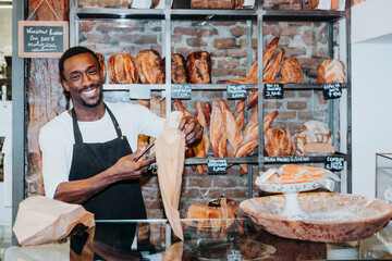 Smiling man working in a bakery