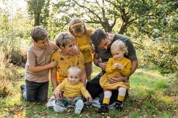 Group picture of family on a meadow