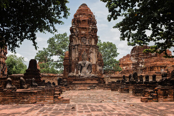 Ancient Buddha statue at temple in Ayutthaya, Thailand, Asia