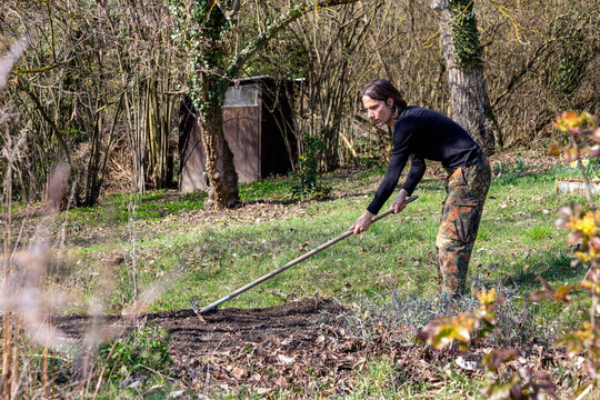 Man ploughing bed