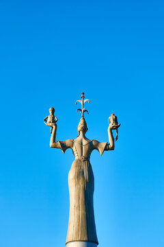 Germany, Constance, back view of Imperia statue against blue sky