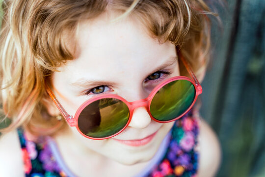 Portrait of little girl wearing sunglasses