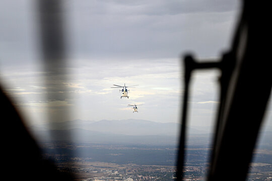 Spain, Madrid, Police helicopters flying above city