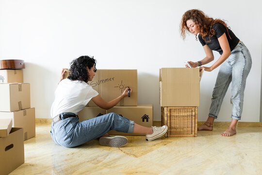 Two friends moving into new home