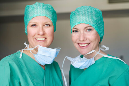Portrait of two smiling women in scrubs
