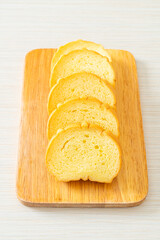 potatoes bread sliced on wood board