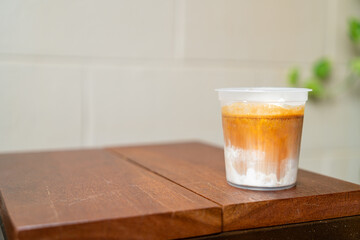 dirty coffee in takeaway glass