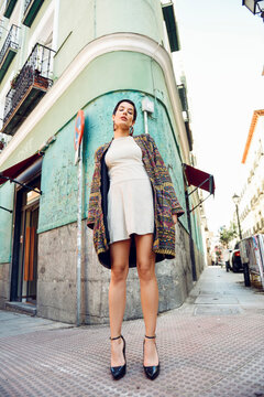 Fashionable young woman posing in the city