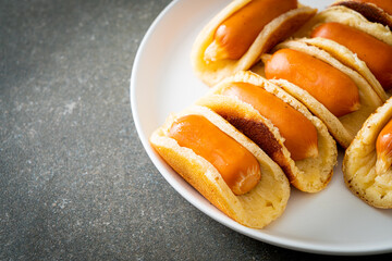 flat pancake roll with sausage