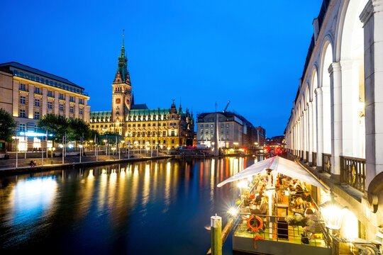 Germany, Hamburg, City Hall and Little Alster at blue hour