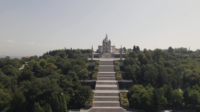 Majestic hilltop church, Sanctuary of Our Lady of Sameiro, Braga, Portugal. Aerial dolly out