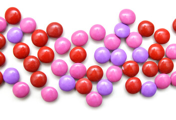 sugar coated pills on white