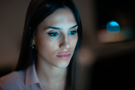 Portrait of young woman working in office